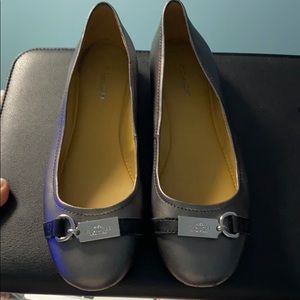 Silver and black Coach flats